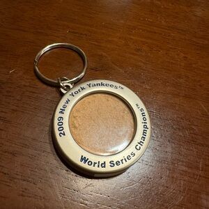 2009 New York Yankees World Series Game Used Dirt Keychain Authentication